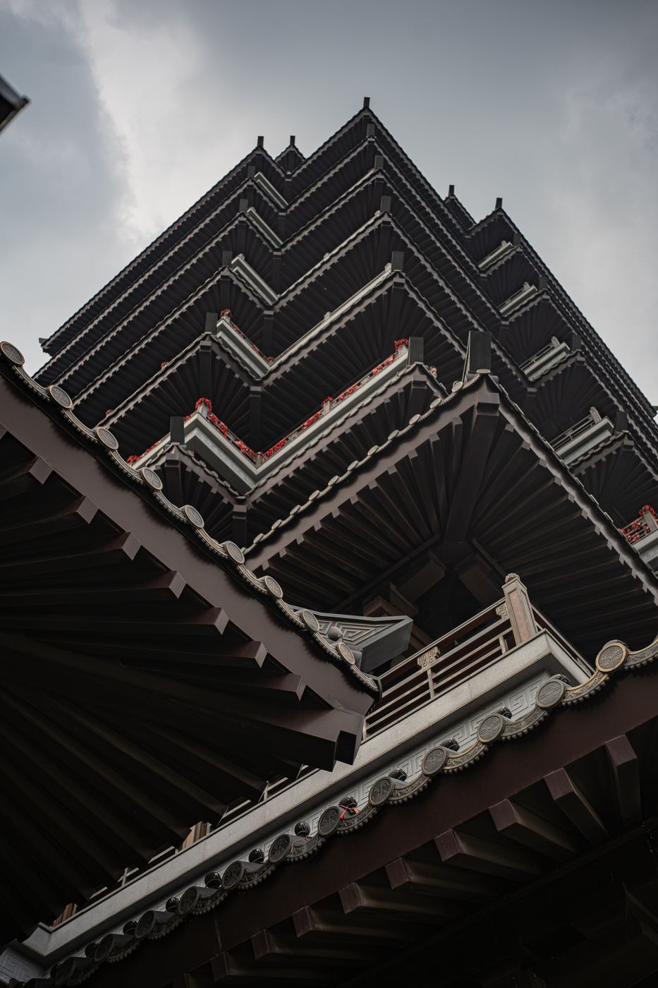 Layered temple eaves rising against the sky